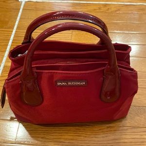 Adorable red durable handbag